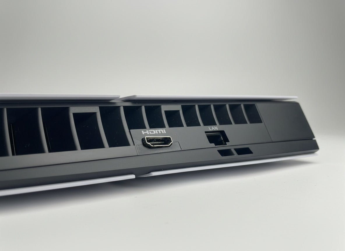 Close-up of a broken HDMI port on electronic equipment.